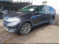 2017 Honda CR-V — photo 2 of 13 | VIN 2HKRW2H5XHH678156