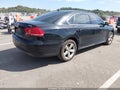 2013 Volkswagen Passat — photo 4 of 16 | VIN 1VWBN7A31DC137400