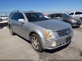 2004 Cadillac SRX — photo 1 of 12 | VIN 1GYDE63A740136619