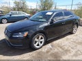 2014 Volkswagen Passat — photo 2 of 17 | VIN 1VWAT7A34EC030151