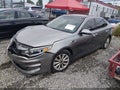 2016 Kia Optima — photo 2 of 18 | VIN 5XXGU4L36GG107725