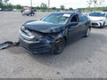 2016 Honda Civic — photo 2 of 16 | VIN 19XFC2F57GE014219