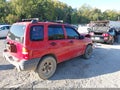 1999 Chevrolet Tracker — photo 4 of 16 | VIN 2CNBJ13C8X6909554