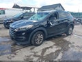 2016 Hyundai Tucson — photo 2 of 16 | VIN KM8J23A41GU123645