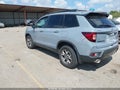 2023 Honda Passport — photo 3 of 16 | VIN 5FNYF8H67PB017740
