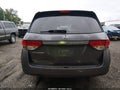 2014 Honda Odyssey — photo 16 of 16 | VIN 5FNRL5H47EB049109