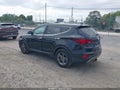 2017 Hyundai Santa Fe — photo 3 of 16 | VIN 5XYZTDLB0HG381003