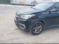2017 Hyundai Santa Fe — photo 6 of 16 | VIN 5XYZTDLB0HG381003