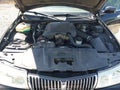 2002 Lincoln Town Car — photo 10 of 16 | VIN 1LNHM83W12Y667908