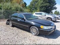 2002 Lincoln Town Car — photo 1 of 16 | VIN 1LNHM83W12Y667908