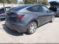 2023 Tesla Model Y — photo 4 of 21 | VIN 7SAYGDEE4PA151882