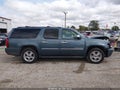 2010 Chevrolet Suburban 1500 — photo 13 of 16 | VIN 1GNUKKE36AR149544