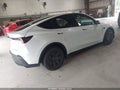 2026 Tesla Model Y — photo 4 of 15 | VIN 7SAYGDEE0TA718342