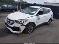 2018 Hyundai Santa Fe — photo 2 of 11 | VIN 5NMZU3LB8JH088811