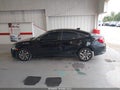2018 Honda Civic — photo 14 of 16 | VIN 2HGFC2F77JH543605