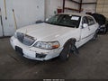 2003 Lincoln Town Car — photo 2 of 16 | VIN 1LNHM83W63Y622304