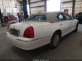 2003 Lincoln Town Car — photo 4 of 16 | VIN 1LNHM83W63Y622304