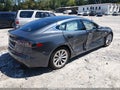 2016 Tesla Model S — photo 4 of 15 | VIN 5YJSA1E24GF154194