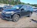 2022 Honda Pilot — photo 2 of 16 | VIN 5FNYF6H67NB069581