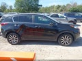 2018 Kia Sportage — photo 13 of 17 | VIN KNDPNCAC7J7321200