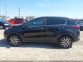 2018 Kia Sportage — photo 14 of 17 | VIN KNDPNCAC7J7321200