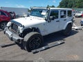 2018 Jeep Wrangler Unlimited — photo 2 of 16 | VIN 1C4BJWEG1JL902414