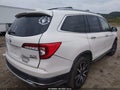 2019 Honda Pilot — photo 4 of 17 | VIN 5FNYF6H09KB014704
