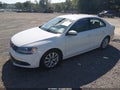 2013 Volkswagen Jetta — photo 2 of 16 | VIN 3VWBP7AJ0DM451174
