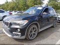 2018 BMW X1 — photo 2 of 17 | VIN WBXHT3Z34J4A66818