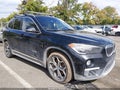 2018 BMW X1 — photo 6 of 17 | VIN WBXHT3Z34J4A66818