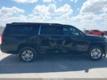 2016 Chevrolet Suburban — photo 13 of 16 | VIN 1GNSCHKC9GR100536