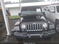 2016 Jeep Wrangler Unlimited — photo 12 of 16 | VIN 1C4HJWEG1GL270355