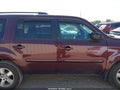 2009 Honda Pilot — photo 14 of 17 | VIN 5FNYF38479B008914