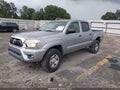 2014 Toyota Tacoma — photo 2 of 16 | VIN 5TFJU4GN0EX058724
