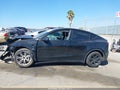2022 Tesla Model Y — photo 15 of 19 | VIN 7SAYGAEE2NF377398