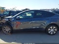 2023 Tesla Model Y — photo 14 of 16 | VIN 7SAYGDEE6PA167789