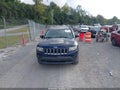 2014 Jeep Compass — photo 12 of 16 | VIN 1C4NJDBB7ED858512