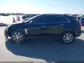2016 Cadillac SRX — photo 14 of 17 | VIN 3GYFNCE36GS538537