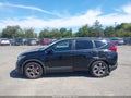 2017 Honda CR-V — photo 14 of 16 | VIN 7FARW1H5XHE030720