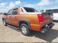 2005 Chevrolet Avalanche — photo 3 of 16 | VIN 3GNEC12Z25G287608