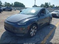 2021 Tesla Model Y — photo 2 of 14 | VIN 5YJYGDEDXMF103855