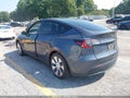 2021 Tesla Model Y — photo 3 of 14 | VIN 5YJYGDEDXMF103855