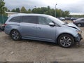 2014 Honda Odyssey — photo 14 of 17 | VIN 5FNRL5H96EB114575