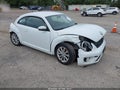 2018 Volkswagen Beetle — photo 1 of 17 | VIN 3VWFD7AT4JM706061