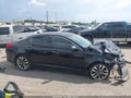 2014 Kia Optima — photo 12 of 15 | VIN 5XXGR4A68EG334510