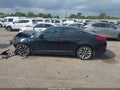 2014 Kia Optima — photo 13 of 15 | VIN 5XXGR4A68EG334510