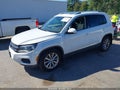 2017 Volkswagen Tiguan — photo 2 of 17 | VIN WVGSV7AXXHK001148