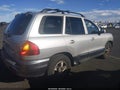 2004 Hyundai Santa Fe — photo 4 of 11 | VIN KM8SC13E74U650077