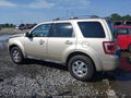 2012 Ford Escape — photo 14 of 16 | VIN 1FMCU0E70CKC35963