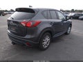 2015 Mazda CX-5 — photo 4 of 11 | VIN JM3KE2CY4F0493964